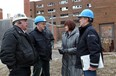 Lee Anne Doyle, second right, chief building official for the City of Windsor, Rob Vani, behind left, manager of inspections and Jamie Demars, left, property standards officer, were joined by two Ministry of Labour inspectors, who did not release their names, at the former Grace Hospital site Tuesday February 7, 2012. (NICK BRANCACCIO/The Windsor Star)