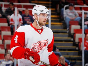 Jakub Kindl #4 of the Detroit Red Wings looks on the St. Louis Blues at Joe Louis Arena on March 30, 2011 in Detroit, Michigan. (Photo by Gregory Shamus/Getty Images)