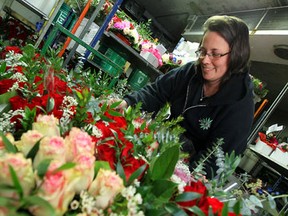 Kelly Mastronardi preparers orders for delivery at Oak Farms in Leamington on Monday, February 13, 2012. Valentines Day is rivalled only by Mother's Day for the busiest day for the shop. (TYLER BROWNBRIDGE / The Windsor Star)
