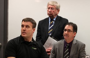 Todd Downey, vice president of operations for Energuy Canada Ltd., NDP MP Joe Comartin (Windsor-Tecumseh) and NDP MP Brian Masse (Windsor-West) participate in a press conference the Fahrhall office in Windsor to discuss the negative effects of the federal government ending the ecoEnergy-Homes program on Friday, Feb. 10, 2012. (DYLAN KRISTY/The Windsor Star).