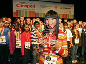 Zhongtian Wang, 11, winner of The Windsor Star Regional Final of the Postmedia Canspell National Spelling Bee at the St. Clair Centre for the Arts, is pictured in front of the entire field of contestants, Sunday, Feb. 26, 2012. (DAX MELMER / The Windsor Star)