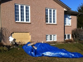 A woman is facing impaired driving charges after she allegedly ran her Jeep into a house early Friday morning at 3242 Robinet Lane.
