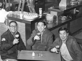 Apr.2/1975-The Lee brothers, left to right, Pete, Jimmy and Ben raise a glass after renovations are made turning Lee's Imperial House into a liquor lounge. (The Windsor Star-Jack Dalgleish)