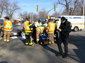 Emergency crews on the scene of a collision at Tecumseh Road and Campbell Avenue on Feb. 28, 2012. (Photo By: Nick Brancaccio)
