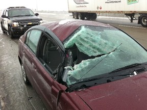 OPP are investigating a collision on 401 westbound near Exit 14 where a Saturn was heavily damaged. (Photo By: Nick Brancaccio)