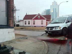 A minivan slammed into a building on Riverside Drive and Louis Avenue on March 1, 2012. (Photo By: Dylan Kristy)