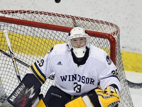 The University of Windsor Lancers Parker Van Buskirk watches the puck during a game against the Western University Mustangs at the Windsor Arena on Friday, March 2, 2012. (TYLER BROWNBRIDGE / The Windsor Star)