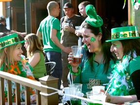 Janice Butters, Mandy Biundo, and Michelle Girard celebrate St. Patrick's day at Mick's Tavern in Windsor, Ont. March 17, 2010. (KRISTIE PEARCE/SPECIAL TO THE STAR)