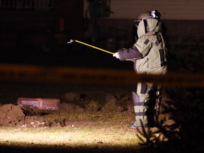 Police investigate suspicious packages found near North Talbot Road and Centre Lake Drive in Windsor on Wednesday, February 29, 2012. OPP and Windsor Police were on the scene. The contents of the containers was not known. (TYLER BROWNBRIDGE / The Windsor Star)