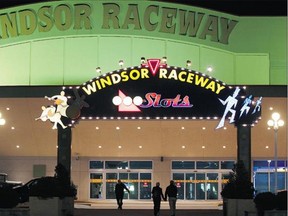 WINDSOR, ONT. MARCH 13, 2012. -- Patrons arrive at Windsor Raceway Slots on Tuesday. The slots will be removed from the track and close by April 30, The Windsor Star has learned. It will cost 215 people their jobs. Slot operations in Sarnia and Fort Erie will also close, a source said. (NICK BRANCACCIO/The Windsor Star)