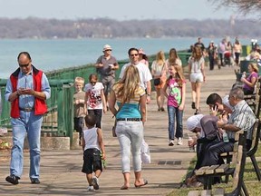 Throngs of people stroll along Windsor's waterfront in downtown Windsor, Sunday, March 18, 2012. (DAX MELMER/The Windsor Star)