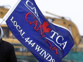 The flag of CAW Local 444 is seen at a protest in January 2012.