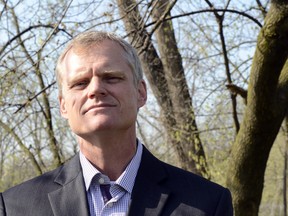 Matthew Child, director of watershed restoration for the Essex Region Conservation Authority, stands amongst trees at Malden Park in Windsor, Ont. on Mar. 22, 2012.