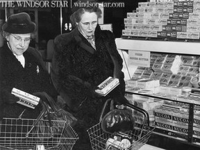Windsor,Ont.-Dec.31 1949- General distribution of margarine was started today to Windsor grocery retailers and all stores will soon carry a complete stock. Nucoa and Margene are trade names of the two butter substitutes. Miss Lucy Bailey of 1509 Dougall Ave. and Mrs W.M. Wilson of 1209 Ouellette Ave. are seen shopping. (The Windsor Star-FILE)