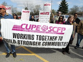 CUPE members rally outside Dwight Duncan's constituency office in Windsor, Ont. on Mar. 26, 2012.