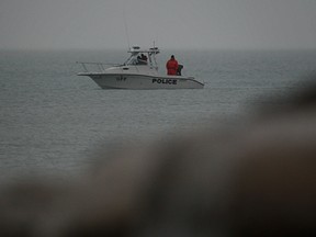 OPP resume their recovery efforts for an 18-year-old female who went missing after a canoe capsized in Lake St. Clair on Sunday, March 11, 2012.