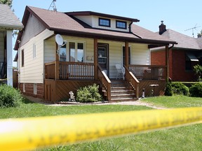 The crime scene at 1642 Moy Ave. in June 2008. This address was the last place that Peter Kambas and Vaios Koukousoulas were seen alive. (Tyler Brownbridge / The Windsor Star)