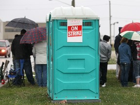 A portajohn sits on the picket line at Dakota Integrated Systems on April 30, 2012. (Dan Janisse / The Windsor Star)