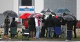 Striking workers gather outside of Dakkota Integrated Systems in Lakeshore, Ont. on the morning of April 30, 2012. (Dan Janisse / The Windsor Star)