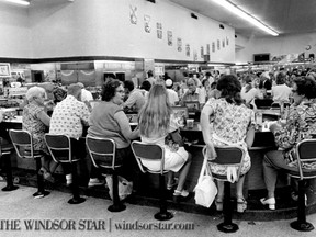 Windsor,ONT. Aug.12/1975- Hordes of people flock to the lunch counter at the Kresge store downtown Windsor. Most diners surveyed said they spend approximately $2-$3 per meal. (The Windsor Star-Cec Southward) HISTORIC