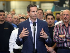 TECUMSEH, ONT. April 10, 2012.:   Premier Dalton McGuinty tours the Omega Tool Corp. plant Tuesday, April 10, 2012, in Tecumseh, Ont.  (DAN JANISSE/The Windsor Star)