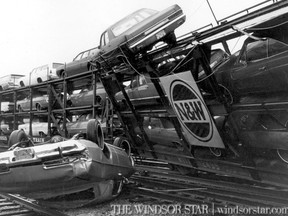 New cars topple from their rail car after the rail cars skipped the track along the city's watrefront rail line.(The Windsor Star-FILE)