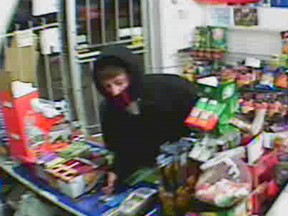 A surveillance camera image of a robber who struck the Mapleleaf variety store at 8151 Wyandotte St. East in Windsor, Ont. on Sunday, April 15, 2012.