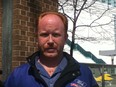 Wililam Donald Rushlow stands outside court buildings in Windsor, Ont. on April 5, 2012. Rushlow was found innocent on Thursday of six criminal charges including arson and fraud. (Monica Wolfson / The Windsor Star)