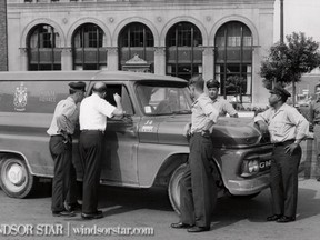 Windsor,ONT. July 22/1965- Postal workers discuss the Windsor walkout as Postal workers across the country walked off the job. (The Windsor Star-FILE)
