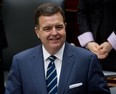 TORONTO, ONTARIO: MARCH 27, 2012 - Ontario Finance Minister Dwight Duncan smiles as he delivers the 2012 Ontario budget in the Ontario legislature in Toronto, Ontario,  Tuesday, March 27, 2012.   (Tyler Anderson/National Post)