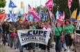 Members of CUPE Local 543 march in a Labour Day parade in this September 2010 file photo. (Dan Janisse / The Windsor Star)