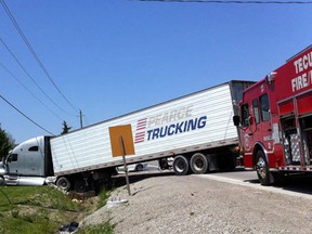 A Highway 3 collision involving a tractor trailer has sent an 18-year-old woman to hospital. (Jason Kryk/The Windsor Star)