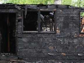 A garage destroyed by an early morning fire is pictured on the 3500 block of Peter Street, Saturday, May 26, 2012. (Dax Melmer/The Windsor Star)