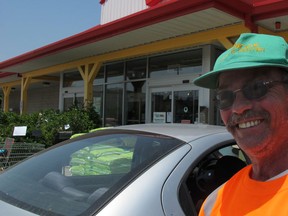 Mike Hamilton is walking from London to Pelee Island to raise awareness and money for brain injury support groups in southwestern Ontario. Hamilton was injured in a bike crash on Pelee Island 40 years ago. (Sarah Sacheli/The Windsor Star)