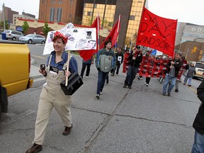 Jodi House leads protesters taking part in the annual May Day Rally in Windsor on Tuesday, May 1, 2012. (Tyler Brownbridge)