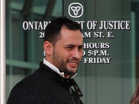 Sabhi (Alex) Bakir is seen leaving the Ontario courthouse in Windsor, Ont. in this February 2012 file photo. Bakir is one of the accused in the Big 3 auto fraud case. (Nick Brancaccio / The Windsor Star)