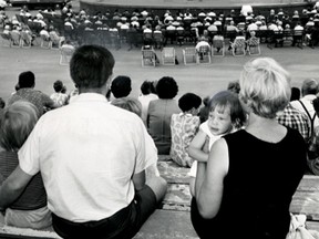 Windsor,Ont. July 14 1968- There were some young fans at Sunday's Parks and Recreation Federation of Musicians band concert. Heather Sargeant cuddled in her mother's arms. (The Windsor Star-FILE)