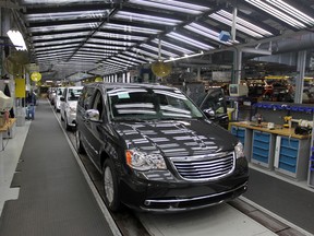 Chrysler minivans roll down the line at the Windsor Assembly Plant in this May 2011 file photo. (Jason Kryk / The Windsor Star)