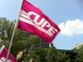 One of many CUPE flags at an 'anti-austerity' rally on May 24, 2012. (Dalson Chen / The Windsor Star)