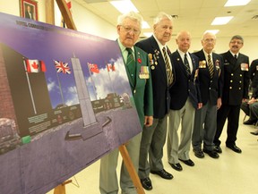 From left: Canadian Forces veterans Ed Caza, Gord Andry, Tom Robson, Herb Rounding and Errol Caza stand by a rendering of improvements to the Essex Cenotaph. Photographed at Legion Branch 201 in Essex, Ont. on May 24, 2012. (Jason Kryk / The Windsor Star)