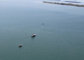 The U.S. Coast Guard confront a Canadian fishing vessel on Lake Erie near North Bass Island on May 3, 2012. The vessel was determined to be fishing 160 yards inside Ohio waters. (Image provided by U.S. Coast Guard)
