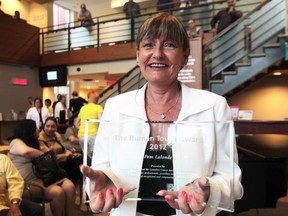 Pam Lalonde of the Windsor Regional Cancer Centre holds the 2012 Human Touch award she received May 29, 2012 at Windsor Regional Hospital. (Jason Kryk / The Windsor Star)