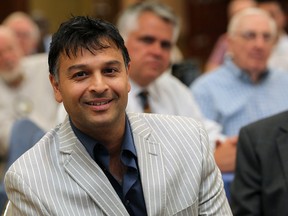 Vascular surgeon Dr. Sowmil Mehta prepares to speak to the Rotary Club of Windsor (1918) at the Caboto Club in WIndsor, Ont. on May 28, 2012. (Nick Brancaccio / The Windsor Star)