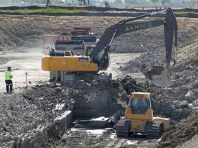 Heavy equipment is used for construction of the Windsor-Essex Parkway. The site pictured is along Highway 3 between Huron Church Line and Howard Avenue. Photographed May 14, 2012. (Dax Melmer / The Windsor Star)