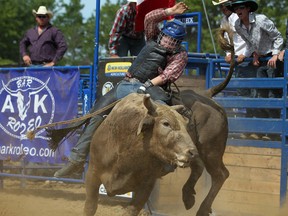 ESSEX, ONT.:MAY 20, 2012 -- Tyson Kemmett, 15, competes in bull riding at the Rock N' Rodeo at the Canadian Transportation Museum in Essex, Sunday, May 20th, 2012.  (DAX MELMER/The Windsor Star)