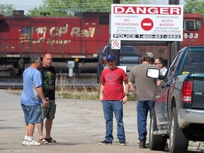 Members of Teamsters Rail Division 528 in Windsor, Ont. join a nationwide strike of CP Rail workers on May 23, 2012. (Dan Janisse / The Windsor Star)