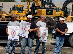 Striking heavy equipment operators form a picket line at a site on Matchette Road in Windsor, Ont. Photographed June 4, 2012. (Nick Brancaccio / The Windsor Star)