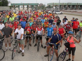 WINDSOR, ONT.: JUNE 17, 2012 -- Approximately 200 hundred cyclists are pictured at the foot of the Ambassador Bridge as they participate in 4th annual Bike the Bridge event, Sunday, June 17, 2012. (DAX MELMER/The Windsor Star)