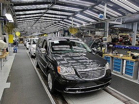 Chrysler minivans roll down the line at the Chrysler Windsor Assembly Plant in Windsor, Ont., on May 26, 2011. (JASON KRYK/The Windsor Star)