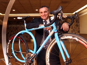 Windsor entrepreneur Lou Tortola unveils his innovative bicycle design at the Caboto Club on Saturday, April 16. The RoundTail bicycle design helps to reduce stress on the rider's spine by absorbing the impact through the two adjacent circles. (By Dylan Kristy).